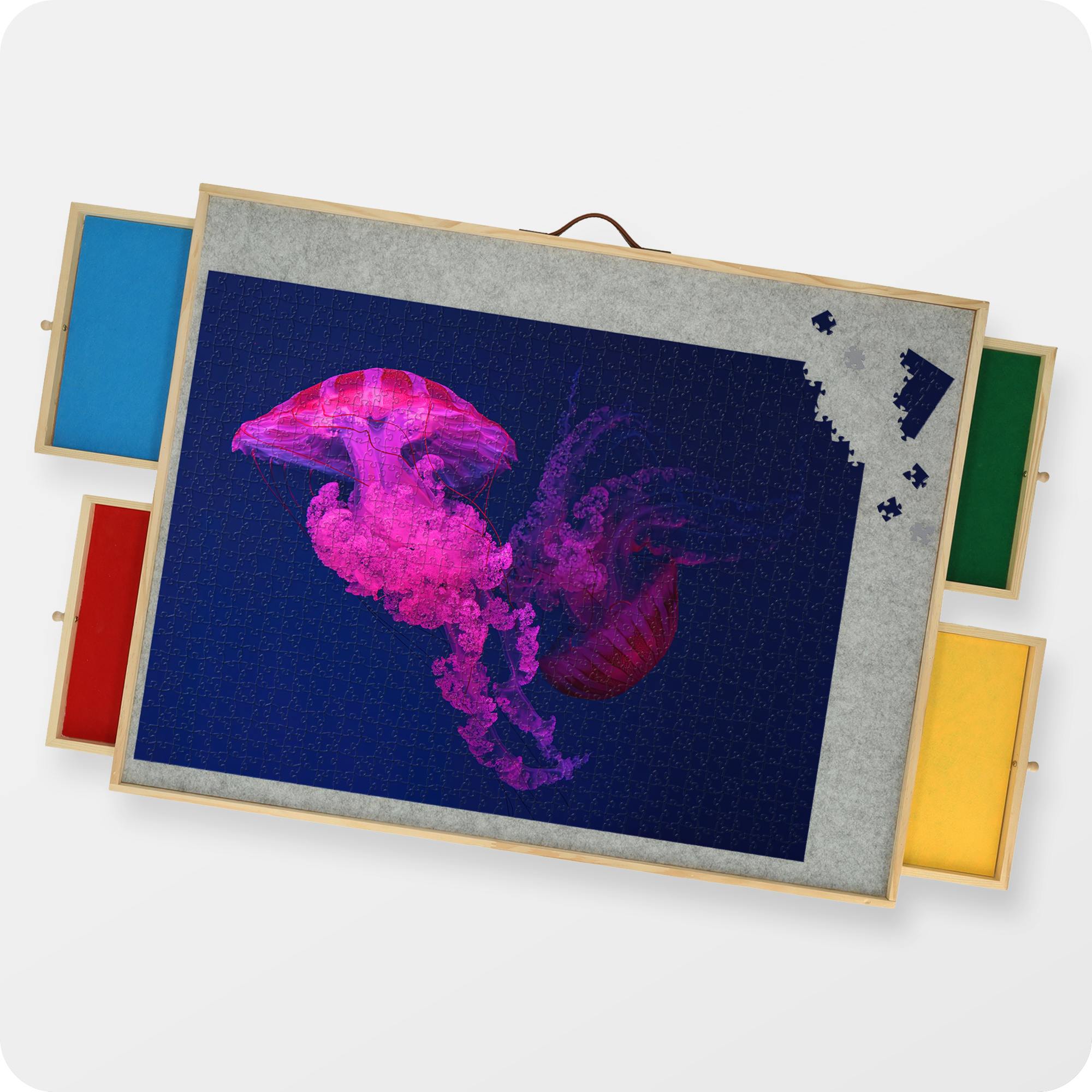 Bovenaanzicht van een ergonomische puzzelplaat met een puzzel van 1500 stukjes erin.